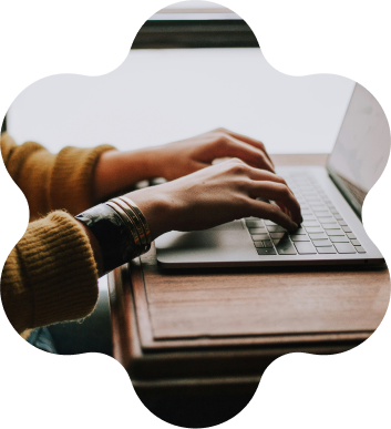 Person typing on laptop computer